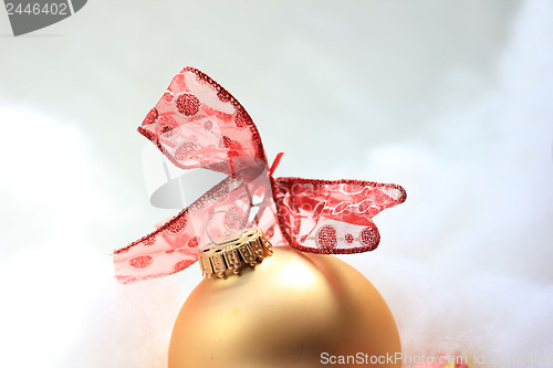 Image of Christmas decorations in red and gold