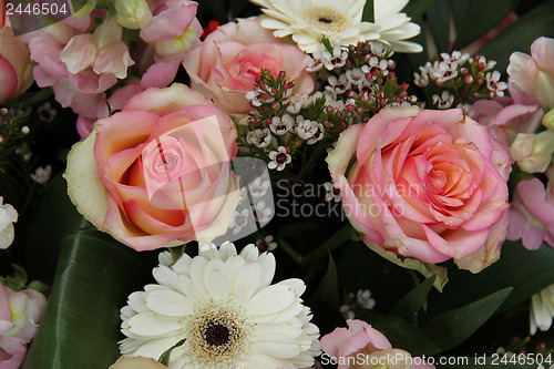 Image of pink roses and white gerberas in bridal arrangement