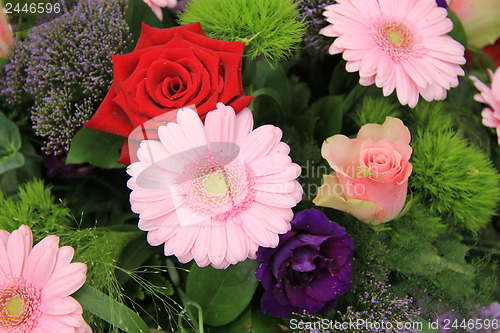 Image of Wedding arrangement in red, pink and purple