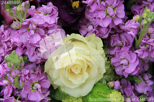 Image of Purple and white bridal arrangement