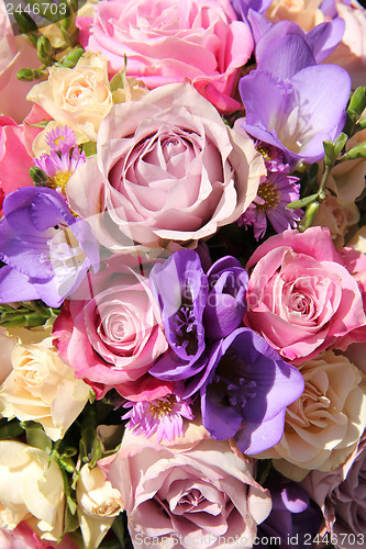 Image of pink and purple wedding bouquet