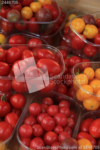 Image of Small tomatoes at a market