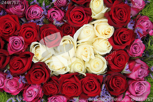 Image of Bridal rose arrangement in red, white and pink