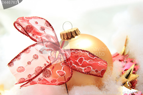 Image of Christmas decorations in red and gold