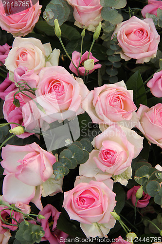 Image of Pink wedding centerpiece: roses and eustoma