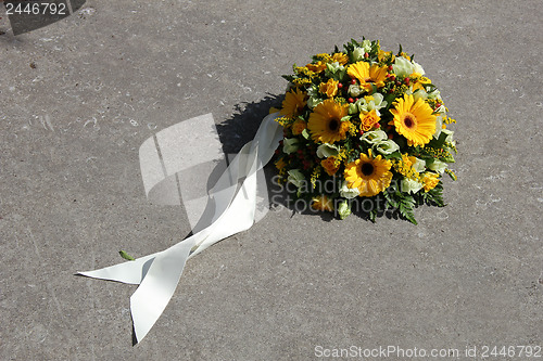 Image of Yellow sympathy flowers