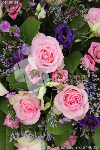 Image of Bridal arrangement in purple and pink