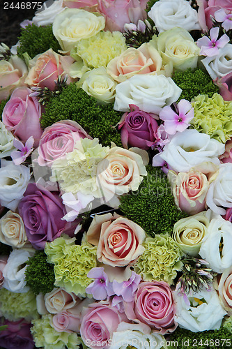 Image of purple, pink and white wedding centerpiece