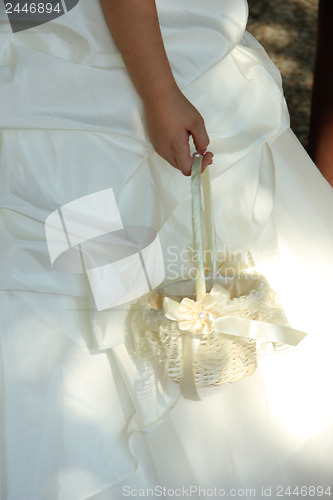 Image of Flower girl holding basket