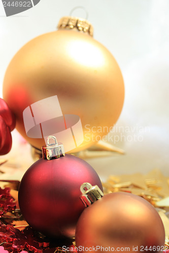 Image of Christmas decorations in red and gold