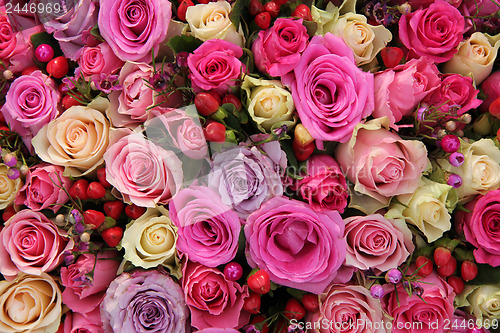 Image of Bridal decorations in different shades of pink and purple