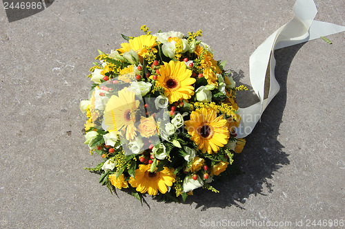 Image of Yellow sympathy flowers