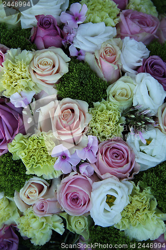 Image of purple, pink and white wedding centerpiece