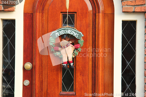 Image of Christmas decorations on a door