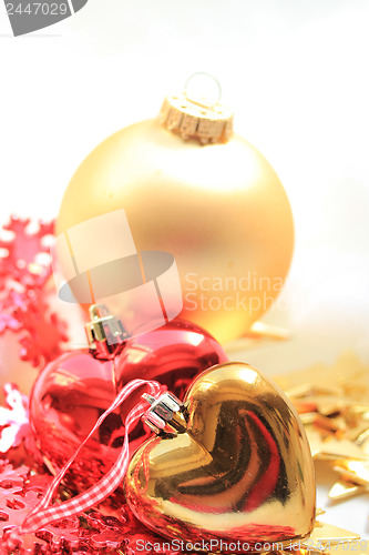 Image of Christmas decorations in red and gold