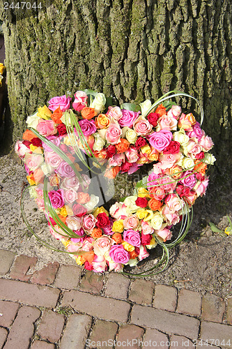 Image of Heart shaped sympathy flowers