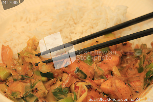 Image of Asian food with chopsticks