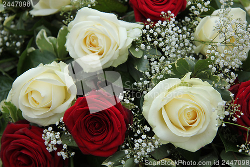 Image of Wedding centerpiece in red and white