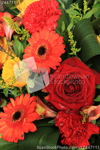 Image of Red, yellow and orange wedding decorations