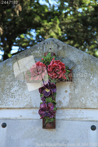 Image of Crucifix with ceramic flowers