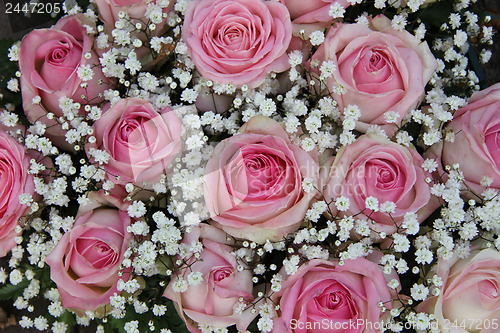 Image of pink roses in bridal arrangement