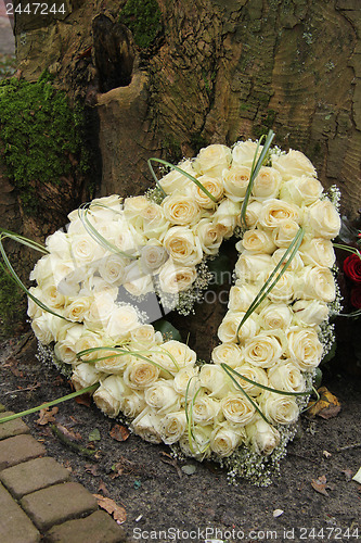 Image of Heart shaped sympathy flowers