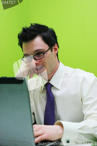 Image of Man working on a computer