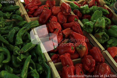 Image of Jalapeno and bell peppers at a market