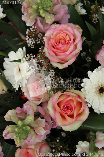 Image of pink roses and white gerberas in bridal arrangement