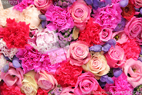 Image of Bridal decorations in different shades of pink and purple