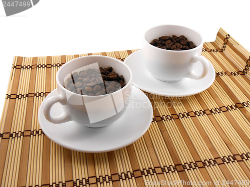 Image of Coffee cup set top view on bamboo table