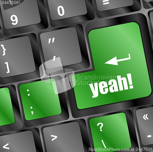 Image of yeah word on computer keyboard key