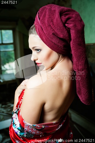 Image of pretty woman with a towel
