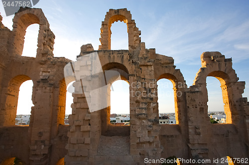 Image of 	El Djem Amphitheatre arches with sunset