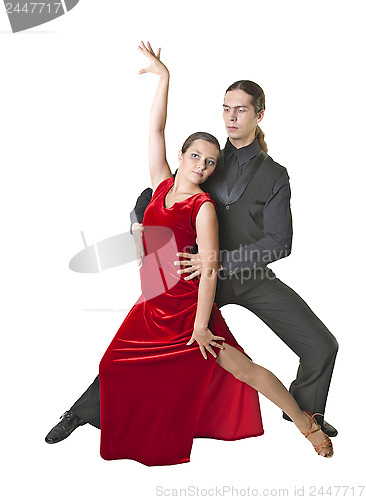 Image of Young couple dancing tango