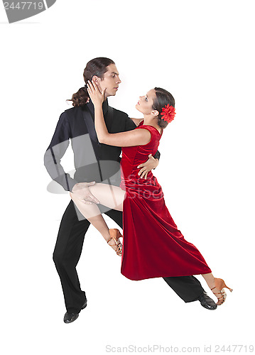 Image of Young couple dancing tango