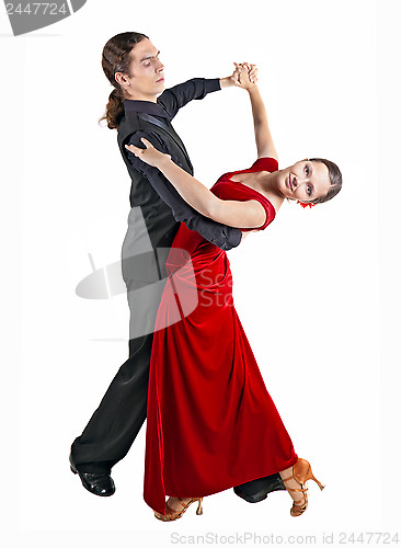 Image of Young couple dancint waltz