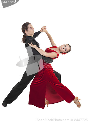 Image of Young couple dancint waltz