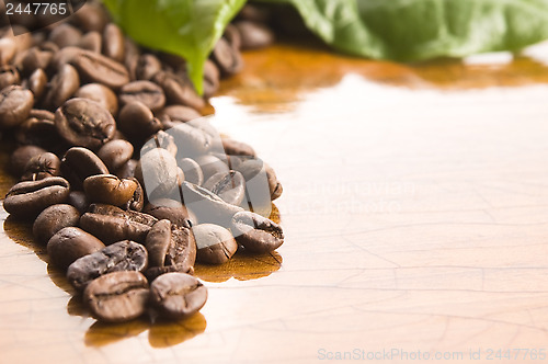 Image of Coffee on wooden background 