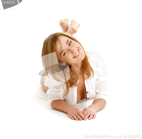 Image of happy girl laying on the floor