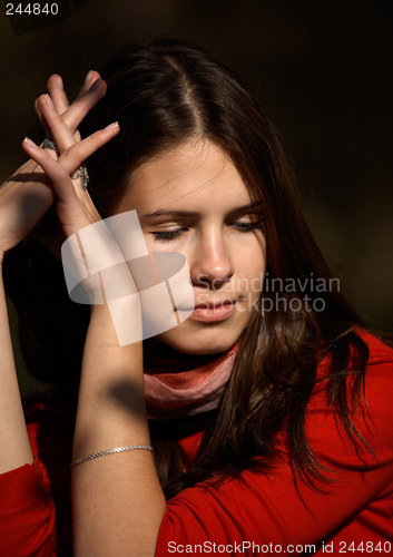 Image of Thoughtful brunette girl