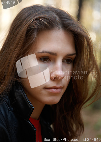 Image of Thoughtful brunette girl