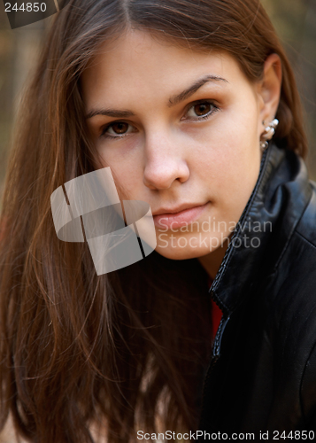 Image of Thoughtful brunette girl