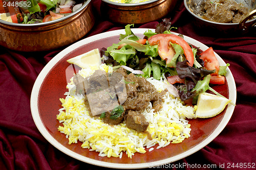 Image of Beef rogan josh dinner with bowls
