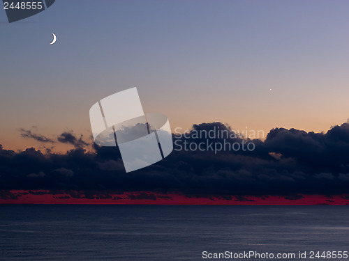 Image of Moon and Venus Over Water