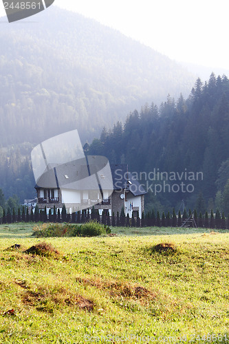 Image of House among mountains