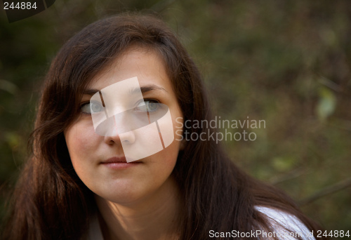 Image of Thoughtful brunette girl