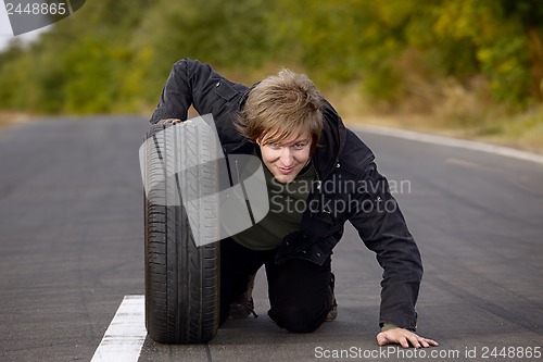 Image of Man With Wheel