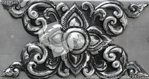 Image of simple ornament, minted in silver