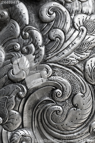 Image of engraving on silver, background